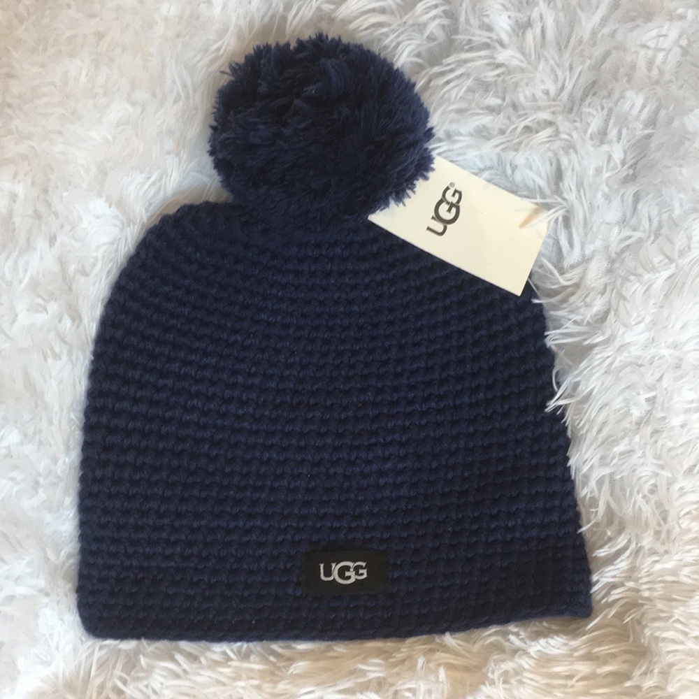 Ugg knit beanie with yarn pom